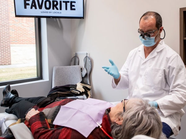 Dr. Hill talking to a patient