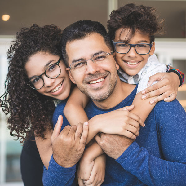 Father with daughter and son smiling