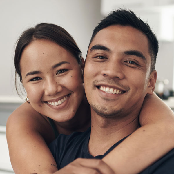 young couple smiling