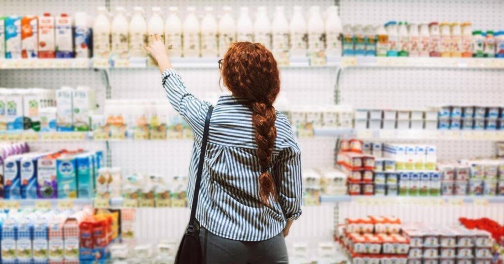 Woman shopping in supermarket.