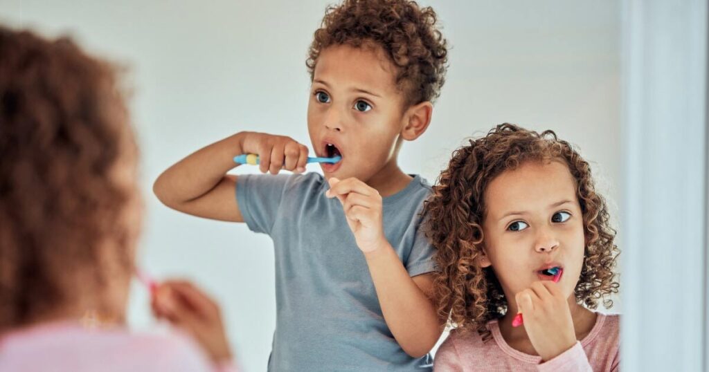 Kids brushing teeth